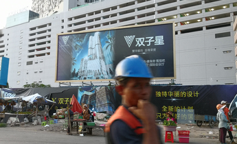 Aside construction sites grounded with chinese billboards 