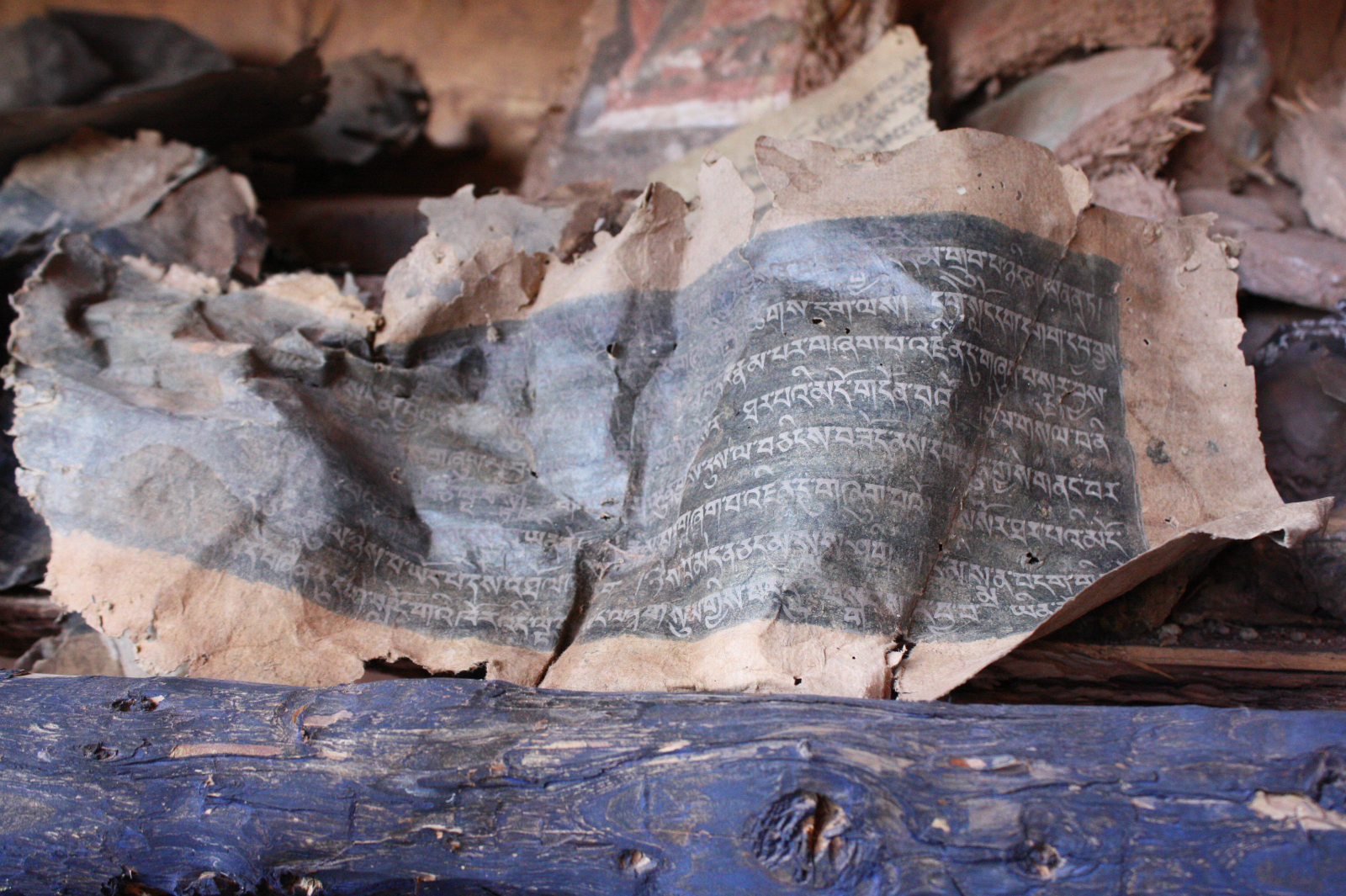 Ancient Buddhist scriptures and relics from a looted pagoda. (Image by Wang Yan