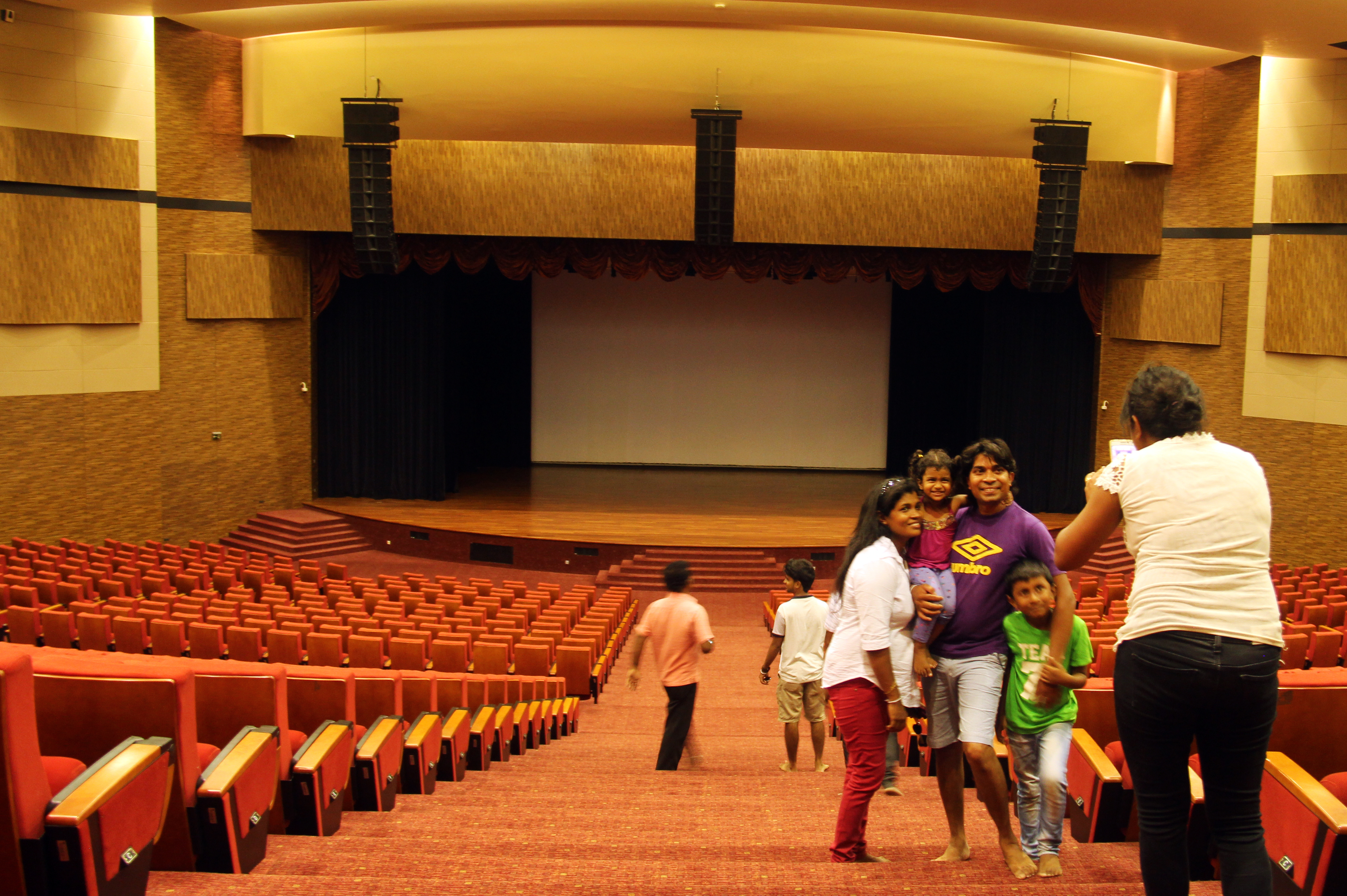 Local tourists pose for photos at the empty Convention centre in sri lankan news