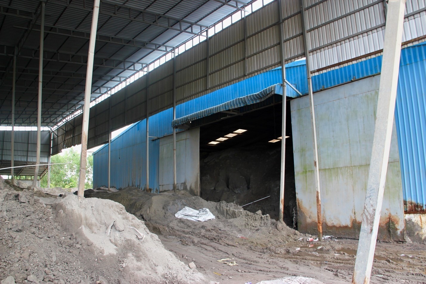 Coal ash, stored in the blue warehouse (Image: Lili Pike)