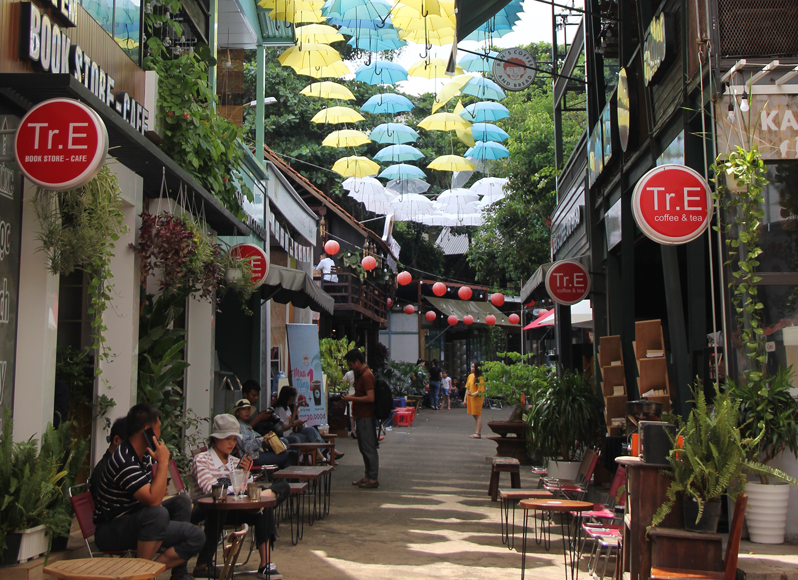 In a street recently renovated for Buon Ma Thuot's coffee festival, tourists sat in cafes on a Saturday morning. 